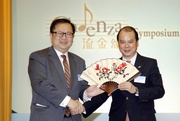 The Hong Kong Jockey Club Steward Dr Donald K T Li (left) presents a souvenir to Secretary for Labour and Welfare The Hon Matthew Cheung (right). Mr Cheung says this symposium provides a timely and useful platform for us to take stock of our overall performance. In effect, this is a health check and the findings will shed light on our strengths and deficiencies.