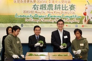 Photo 3:  The Jockey Club's Executive Director, Charities, Douglas So (2nd from right), and General Secretary of Hong Chi Association Aldan Kwok (2nd from left), accompanied by Hong Chi trainees, perform the opening ceremony of the competition. The Hong Chi trainees are veteran gardeners and good at taking care of rooftop gardens.