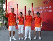 The Club!|s torchbearers at the Guangzhou 2010 Asian Games: (from left) Club Deputy Chairman and President of the Hong Kong Equestrian Federation Dr Simon Ip, Club Junior Equestrian Team member Jasmine Lai and Club Apprentice Jockeys Derek Leung and Keith Yeung.