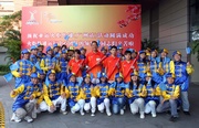 (Second row) The Club!|s torchbearers Deputy Chairman and President of the Hong Kong Equestrian Federation Dr Simon Ip (fifth from left), Club Junior Equestrian Team member Jasmine Lai (fourth from left) and Club Apprentice Jockeys Derek Leung (sixth from right) and Keith Yeung (fifth from right) are taking group photo with the cheerleaders.
