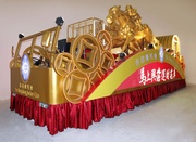 The Hong Kong Jockey Club today (31 January) showcases its float for this year's International Chinese New Year Night Parade, featuring two giant racehorses drawing lucky gold coins that are sure to make it one of the striking floats in the parade.  It will also be one of the most dazzling, thanks to a fine layer of genuine gold powder coating the horse sculptures, bringing good fortune to all who see them.
Titled 