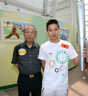 The Hong Kong Jockey Club Chairman John C C Chan with Matthew Chadwick at today's 2009 East Asian Games Torch Relay.