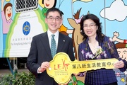 Club Executive Director, Charities, Legal & Corporate Secretariat, Douglas So (left), handover a symbolic key of the eighth Life Education Centre to Chairman of Life Education Activity Programme Quince Chong (right).