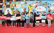 Club Executive Director, Charities, Legal & Corporate Secretariat, Douglas So (4th from right); Chairman of Life Education Activity Programme Quince Chong (6th from left); and winners of !Draw a Healthy Life!L Graphics Design Competition.