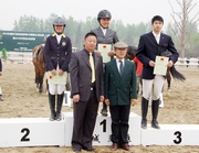 Photo 5 and 6: Jasmine Lai (Photo 5 and Photo 6 left), a member of the HKJC Junior Equestrian Team, demonstrated her great talents in the Beijing qualifier by claiming the individual silver medal with 4 clear rounds.