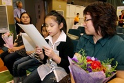 Photos 5/6: Cheuk-lam (photo 5, 2nd from right) reads out the letter she writes for her mother (photo 5, 1st from right).