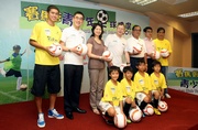 Club Chief Executive Officer Winfried Engelbrecht-Bresges (centre), the Club!|s Executive Director, Charities, Legal & Corporate Secretariat, Douglas So (2nd from left), Chairman of Hong Kong Football Association Brian Leung (3rd from right), Assistant Director of Leisure and Cultural Services Olivia Chan (3rd from left), and Director of Hong Kong Football Association and Convenor of Youth Development Taskforce Wilson Wong (2nd from right), pictured with past and present Hong Kong team members Lee Kin-wo (1st from right) and Chan Wai-ho(1st from left) as well as four young footballers. 
