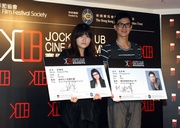 Jockey Club Cine Academy Ambassador Cheung Ka-fai (right) and young director Heiward Mak are presented with JCCA student cards to symbolise their support for the Academy.

