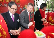 From left to right: Elderly Commission Chairman Dr Leong Che-hung, Club Chief Executive Officer Winfried Engelbrecht-Bresges and CADENZA Project Director Professor Jean Woo participate in the dragon and lion dance eye-dotting ceremony.