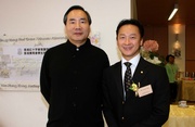 Club Steward Stephen Ip (left) with the School's alumnus Paralympic equestrian rider Nelson Yip.
