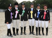 (From right) Jasmine Lai, Taylor Yeung and Kendall Krugar, members of the HKJC Junior Equestrian Team, win the gold, silver and bronze medal in the individual dressage competition respectively, and share the glory with other winners in the same competition.