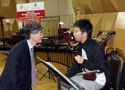 The Hong Kong Jockey Club's Executive Director, Charities, William Y Yiu is delighted to meet one of The Hong Kong Jockey Club Scholarship recipients Szeto Kin who will join the Orchestra to perform in the Carnegie Hall. 