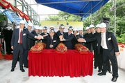Hong Kong Jockey Club Chairman John C C Chan with other guests at the pig-cutting ceremony.