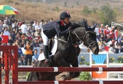 Hong Kong Equestrian Team member Samantha Lam jumps one clear round in the team competition.  She is ranked third after the team event amongst the 33 riders.
