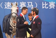 Photo 1 & 2 The Hong Kong Jockey Club Equestrian Team member Patrick Lam (Photo 1: middle / Photo 2: left) won the individual gold medal in the Jumping competition of the 11th National Games of the People!|s Republic of China while another team member Kenneth Cheng (Photo 1 & 2: right) also won the bronze medal in the same event. 
