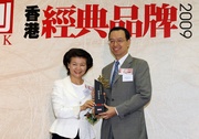 The Club's Executive Director of Corporate Development Kim Mak (right) receives the 