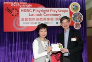 Secretary for Development Carrie Lam and The Hong Kong Jockey Club's Executive Director, Charities, William Y Yiu. 

