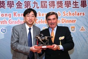 Hong Kong Jockey Club Deputy Chairman T Brian Stevenson presents a token of appreciation to keynote speaker Dr Ko Wing-man.