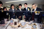 Photo 4/5:  Guests attend the Wan Chai Treasures photo exhibition. 