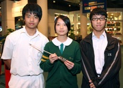 Tony Szeto (left), Cindy Wong (centre) and David Chiu (right) used only HK$400 to invent an award-winning magical pen that can replace costly electronic whiteboards in school. 