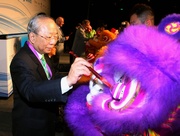 Club Chairman Dr John C C Chan and other guests perform the traditional lion eye-dotting ceremony.